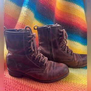 Women’s brown leather Steve Madden lace up boots. Size 7.5.
